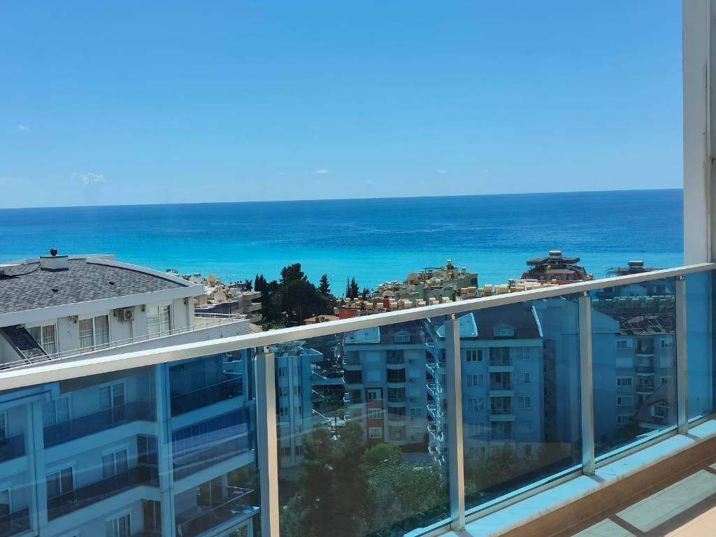 Furnished 3-bedroom duplex apartment with sea view for sale in Alanya - Tosmur 